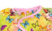 Long sleeved bib, waterproof, with built-in pocket bag In the Butterflies