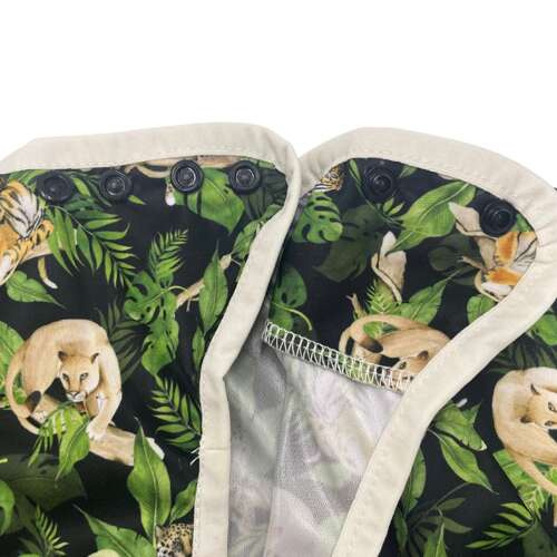 Long sleeved bib, waterproof, with built-in pocket bag In the WILD CATS