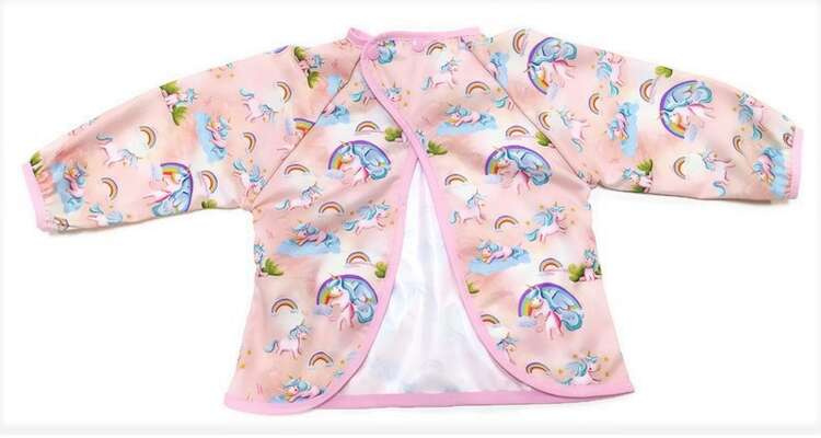 Śliniak fartuszek z rękawami Jednorożce – detal materiału